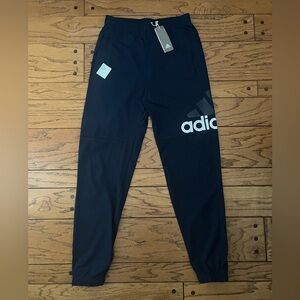 Navy Adidas essential sweat pants
